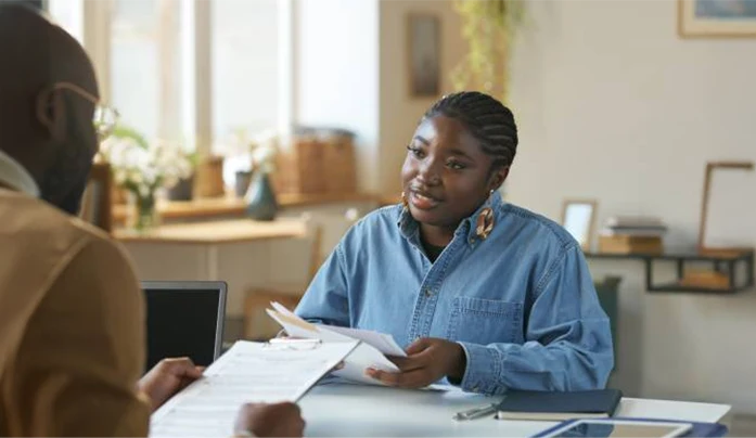 Woman looking over documents
